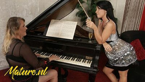 piano video: MILF piano teacher gets naughty with that girl and they lick each other