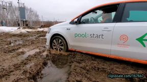 leather pants video: Sexy real estate agent got her car stuck hard in deep soft mud