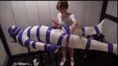 mummification video: Enduring mummification only his cock is left for teasing BDSM