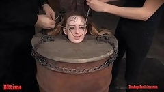 electrified video: Bdsm babe trapped in a barrel and electrified