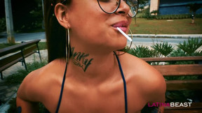 lollipop video: Laura Monroy plays with a lollie pop in a park in Medellin