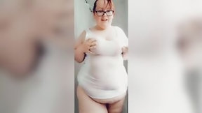 bulge video: BBW getting a soak T shirt inside an ice cold shower