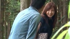 asian outdoor video: Housewife gets seduced in the woods by a young guy