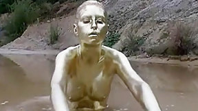 mud video: Golden paint muddy girl