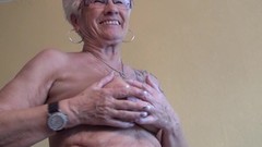 big clit video: Tattooed granny exposes her big clit for your pleasure