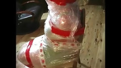mummification video: Mummified Wrap Merry Christmas