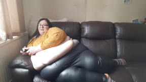 leather pants video: SSBBW gamer girl in leather pants belly