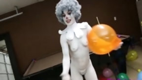 clown video: A clown dressed babe teasing amateur style