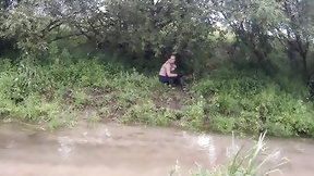 mud video: cutie has pleasure in the mud in a blue suit