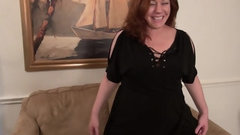 big tits video: Redhead plump mature Bunny B in a black dress plays the fool