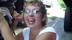 truck video: Mature woman sucks cock between trucks in parking lot