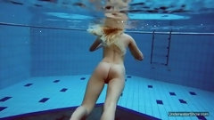 swimming video: Sexiest brunette teen Milana Voda swimming in pool