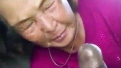 asian and black cock video: Asian Granny Sucks Black Cock In The Car