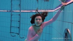 leotard video: Leggy girl goes swimming in her leotard